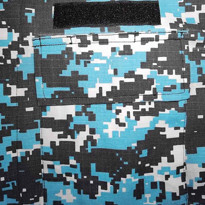 Poches boutonnées de l'uniforme de combat BDU
